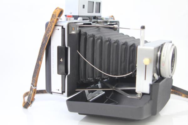 Polaroid LAND CAMERA MODEL 180 ポラロイドカメラ（インスタントカメラ）/ TOMINON 1:4.5 f=114mmの画像1